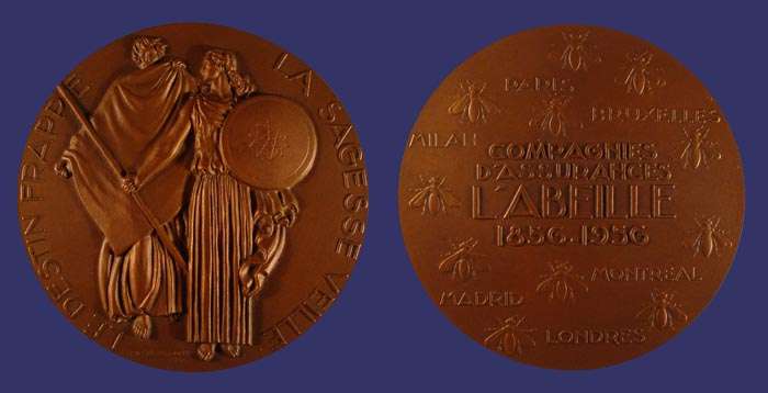 Wisdom and Destiny, 1956
[b]Reference[/b]

Ga. 57, R. Gailhouste, "Numismatique de l'Assurance Franaise," Castres, 2002.

This medal celebrates the centenary of the insurance company Compagnie d'Assurances l'Abeille

[b]Obverse:[/b]  A man with a large cape (Destiny) and a woman (Wisom/Insurance) with a spear and a shield. "Le Destin Frappe- La Sagesse Veille" (Destiny hurts - Wisdom protects). Signed Raymond Delamarre, 1956.
 
[b]Reverse:[/b] Bees and names of some major cities of the world.  "Compagnie d'Assurances l'Abeille 1856-1956" (Bee Insurance Company, 1856-1956).
Keywords: art_deco