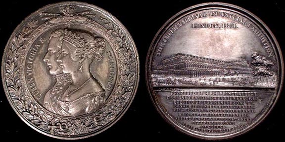1851 Victoria/Albert Expo by Messrs, Allen & Moore
British Historical Medals #2419

White metal BY Messrs, Allen & Moore
39 Gms 51.5 mm Rarity "CC" Common

The Reverse Legend reads
THE INTERNATIONAL INDUSTRIAL EXHHIBITION/LONDON, 1851
in exergue: PROPOSED BY H.R.H. PRINCE ALBERT/DESIGNED BY JOSEPH PAXTON ESQ.F.L.S.,/ERECTED BY FOX,HENDERSON 7 Co.,LEGNTH 1848 FEET, WIDTH 456 FEET,/HEIGHT OF PRINCIPAL ROOF 66 FEET,/HEIGHT OF TRANSEPT108 FEET,/GLAZED SURFACE 90,000 SUP.FEET,/OCCUPIES 18 ACRES/OFGROUND/ESTIMATED VALUE 150,000
