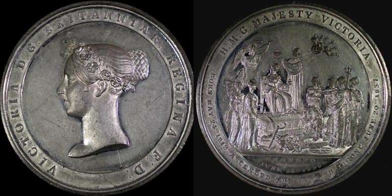 1838 Queen Victoria  Coronation Medal by Davis
Obv: Head of Queen Victoria left, garlanded with roses thistles and shamrocks ,hair held in chignon. On a raised band around the legend reads: VICTORIA D: G: BRITANIAR: REGINA F: D:

Rev: On a raised dais, the Queen is seated on a throne being crowned by the Archbishop of Canterbury. To the right she is proclaimed by the figures Britannia, Scotia and Hibernia. To the left she is attended by Justice and Industry. A winged herald and cherub above, lion and cornucopia with other symbolic objects below. The exergue reads: CROWNED / JUNE 28TH 1838 (in an arc). Signed to the right: DAVIS, BIRM.. On a raised band around, the legend reads above: H. M. G. MAJESTY VICTORIA, and below: BORN MAY 24TH 1819 . ASCENDED THE BRITISH THRONE JUNE 20TH 1837.

White Metal; 64.5 mm; 89.8 gm. BHM# 1807 Rarity "R" RARE

