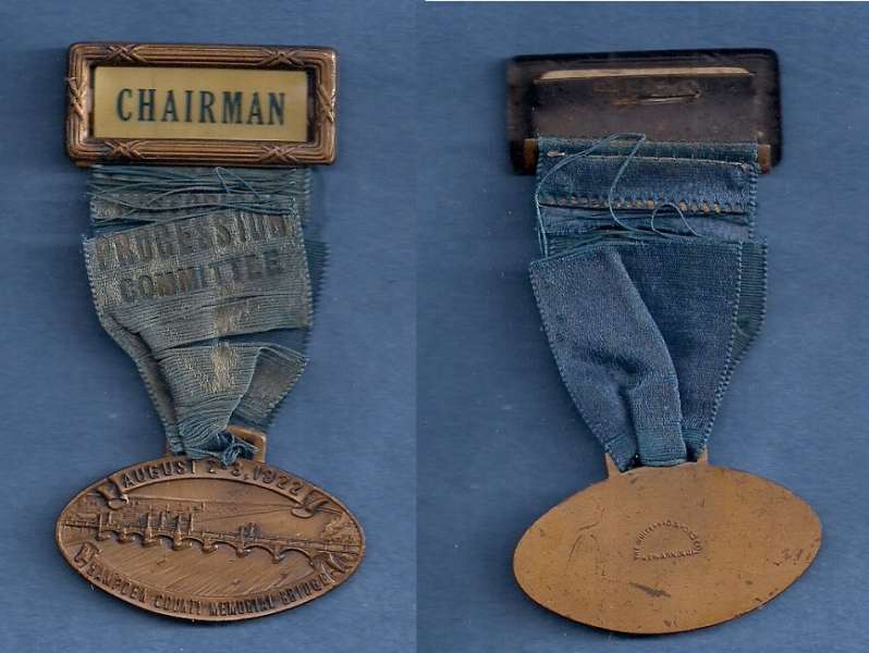 1922 HAMPDEN MEMORIAL BRIDGE DEDICATION - CHAIRMAN'S MEDAL
Unlisted in Storer.  Struck by the Whitehead & Hoag Co. of Newark N.J.
The oblong bronze medal is 46mm wide.  What remains of the blue ribbon reads:  "HISTORICAL PROCESSION COMMITTEE"  
